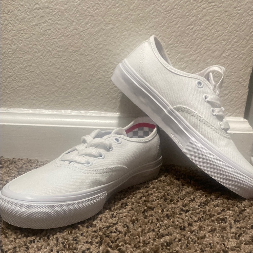 Vans White Canvas Sneakers with Red Accents
